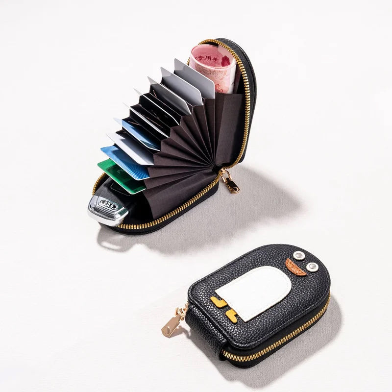 Kortholder - kompakt og slitesterk pingvinmønster