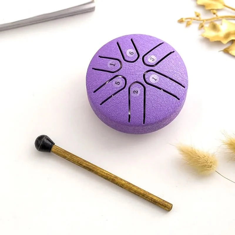 Mini tambor relajante con sonidos apacibles integrados 